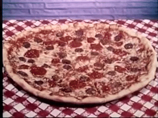 An animated Gif of an evenly sliced pizza going away one slice at a time, until the ending where multiple people reach for the last slice at the same time. Showcasing the divisibility of Money to help explain the importance of Bitcoin